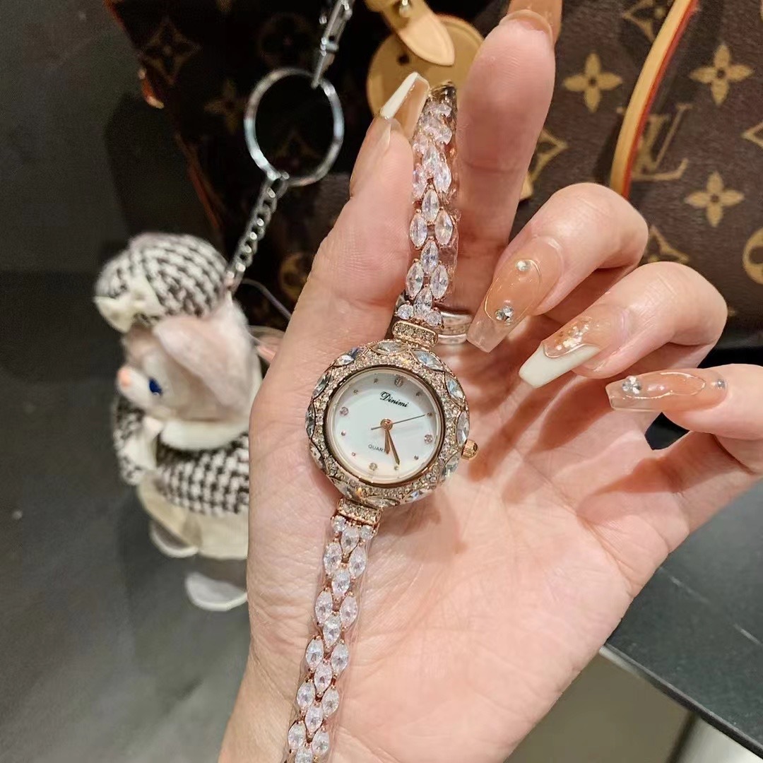 นาฬิกาข้อมือผู้หญิงสไตล์เกาหลี - Luxury Watch Values บทวิจารณ์และราคา
